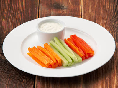 Vegetable sticks with cheese sauce