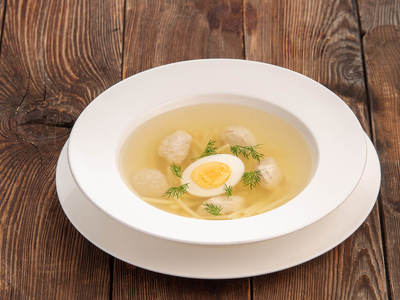 Broth with chicken quenelles